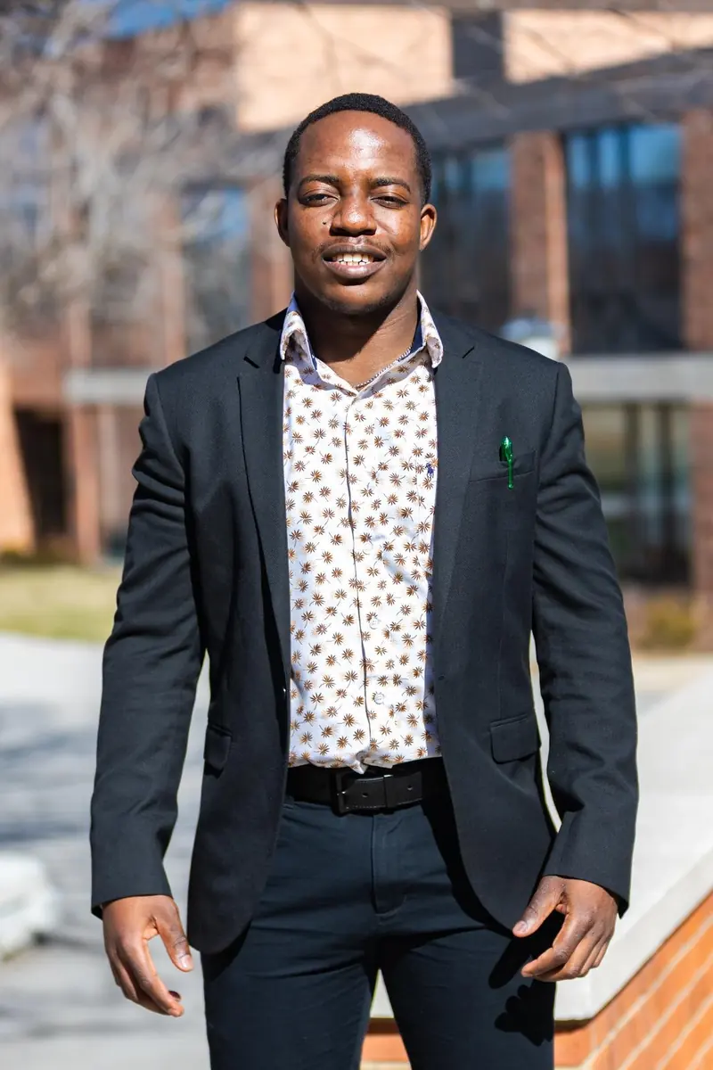 Portrait of Kudakwashe (Kuda) E. Sandi, Founder and CEO of Eagle Elevate