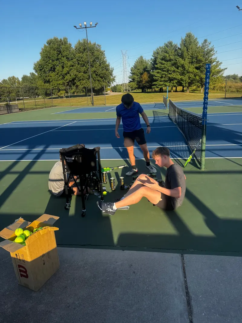 Players working together to set up for a training session